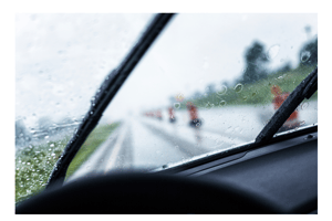 Driving in the rain with windshield wipers on